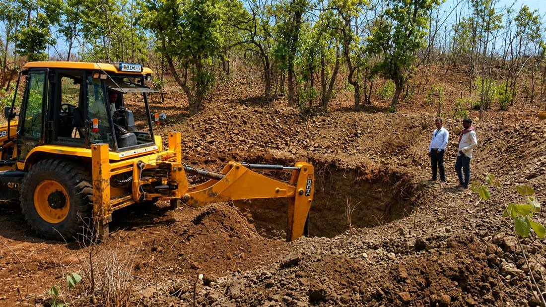Excavating a Doha structure in the stream bed