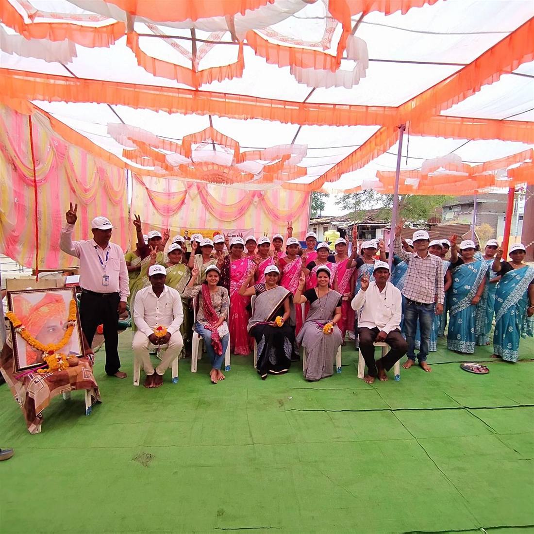 A large gathering of Dilasa self-help group members at a village programme