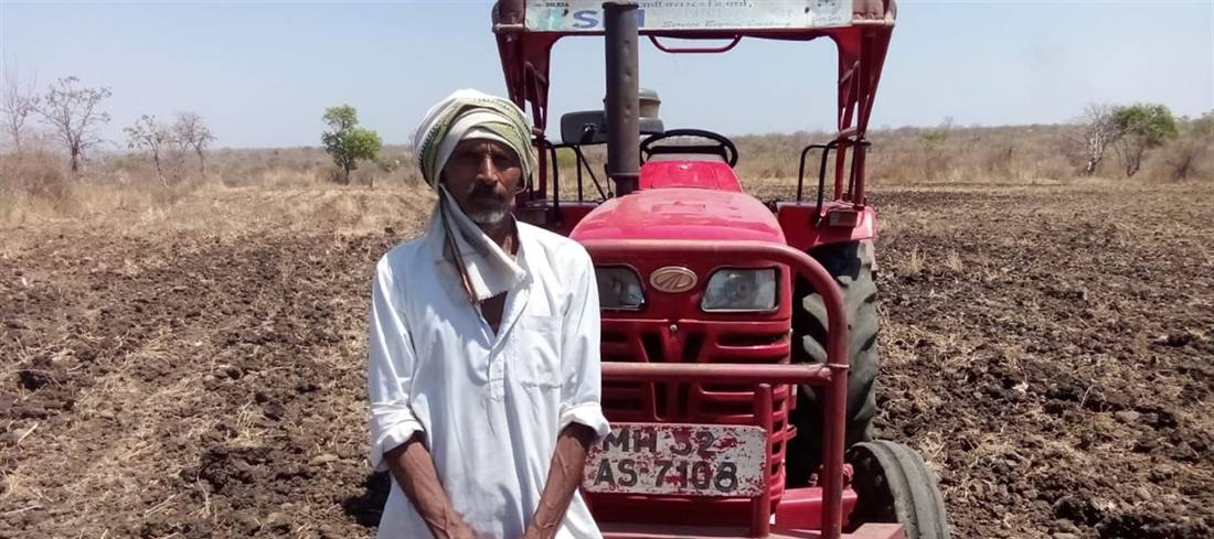 A farmer with a tractor from the village Custom Hiring Centre