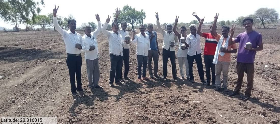 Villagers at the handover of a completed structure