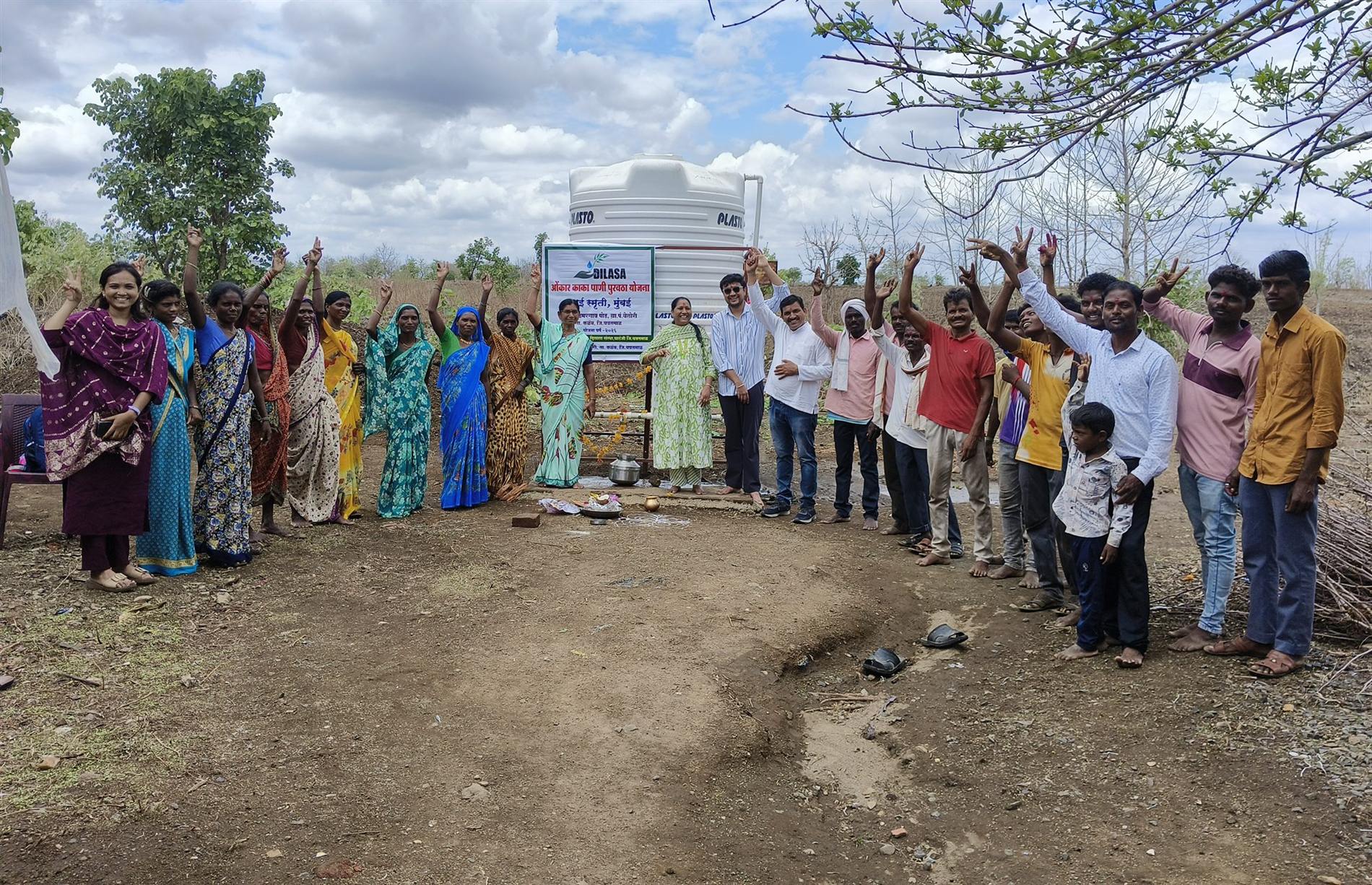 Villagers gathered at a completed Dilasa water conservation site